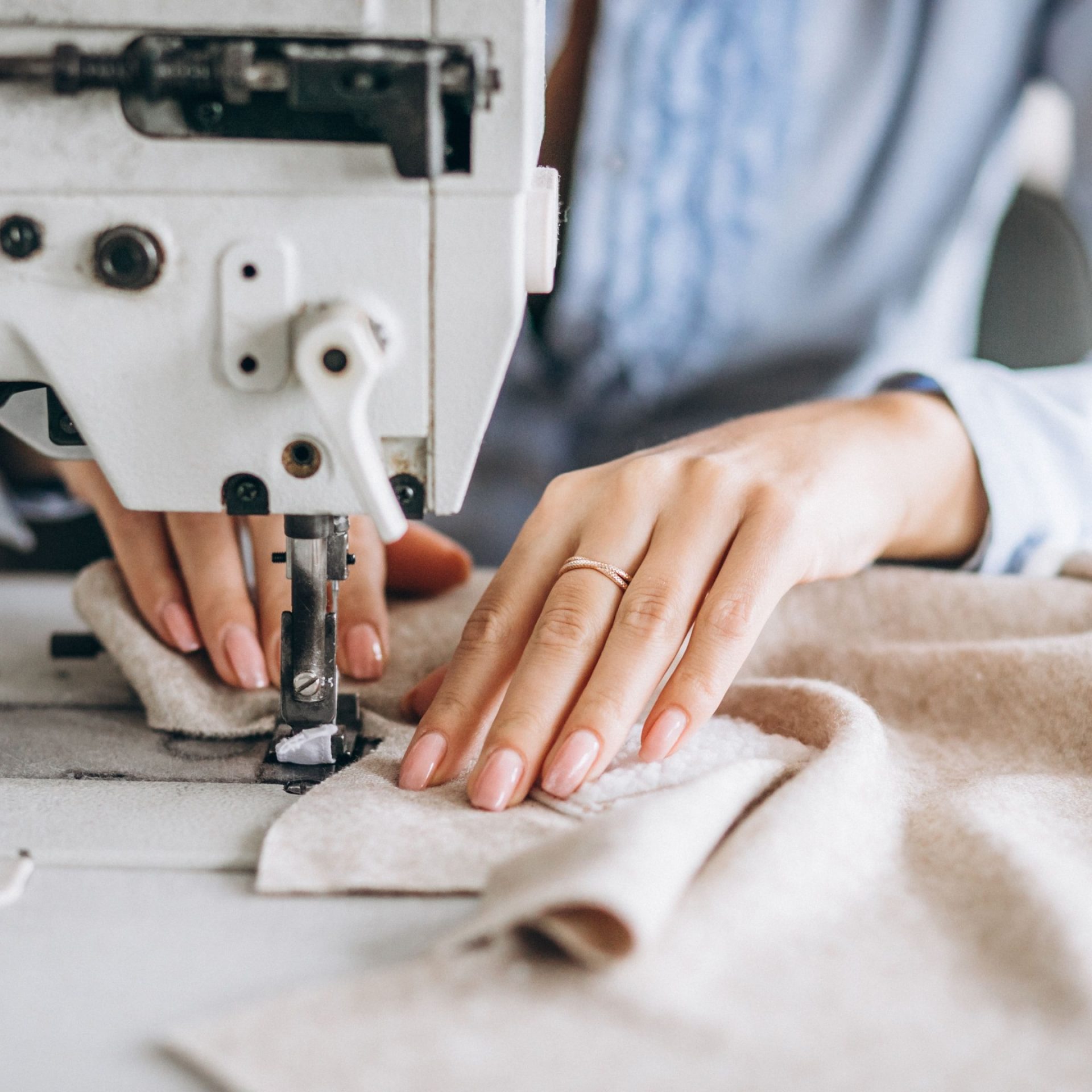 woman-tailor-working-sewing-factory